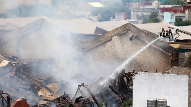 Горящая стена убила девять пожарных в столице Аргентины