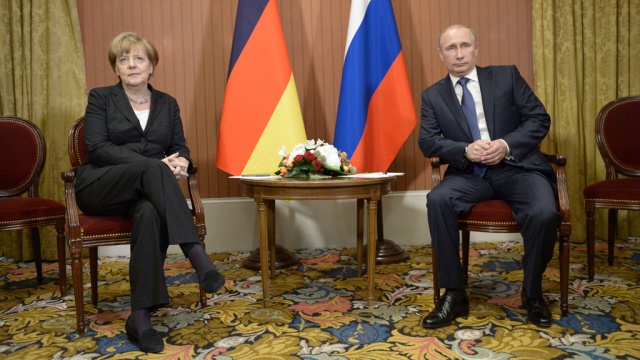 Путин и Меркель час обсуждали урегулирование украинского кризиса