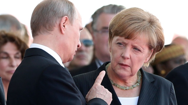 Путин в Рио-де-Жанейро поговорил с Меркель на немецком языке