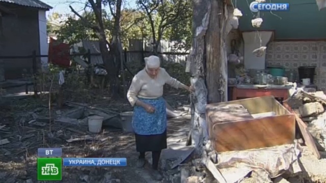 Жители Донецка возвращаются в разрушенные дома